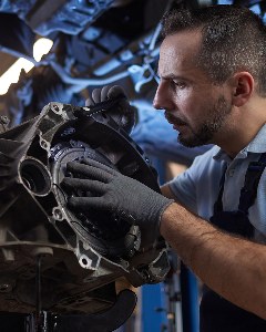 Mechanic working on a transmission