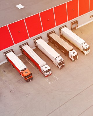 Trucks at a distribution centre loading dock
